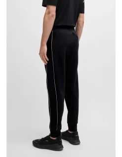 Embossed-Artwork Stretch Cotton Tracksuit Bottoms
