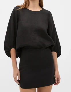 LINEN CURVE HEM MINI SKIRT