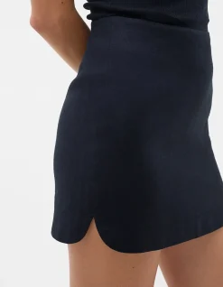 LINEN CURVE HEM MINI SKIRT