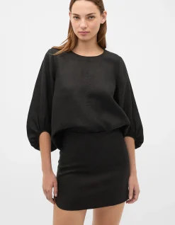 LINEN CURVE HEM MINI SKIRT