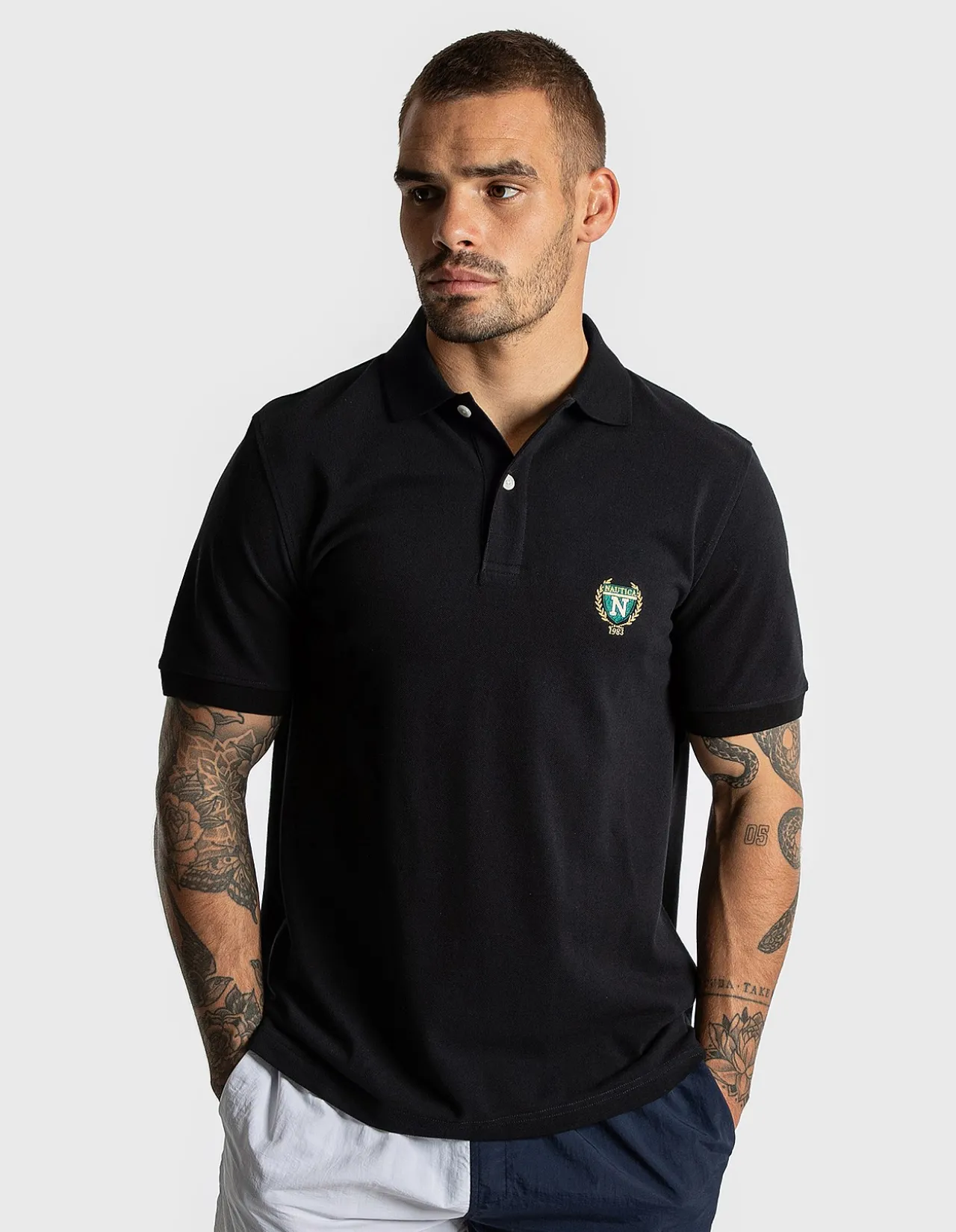 REGULAR FIT EMBROIDERED CREST PIQUE POLO