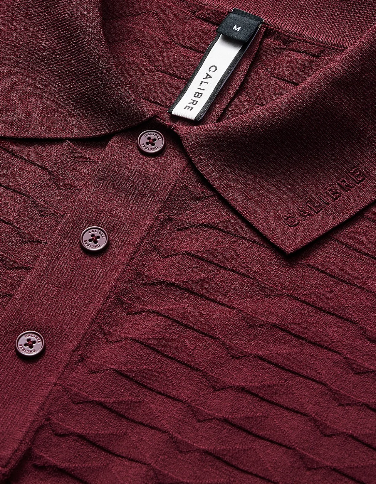 TRIANGLE KNIT POLO