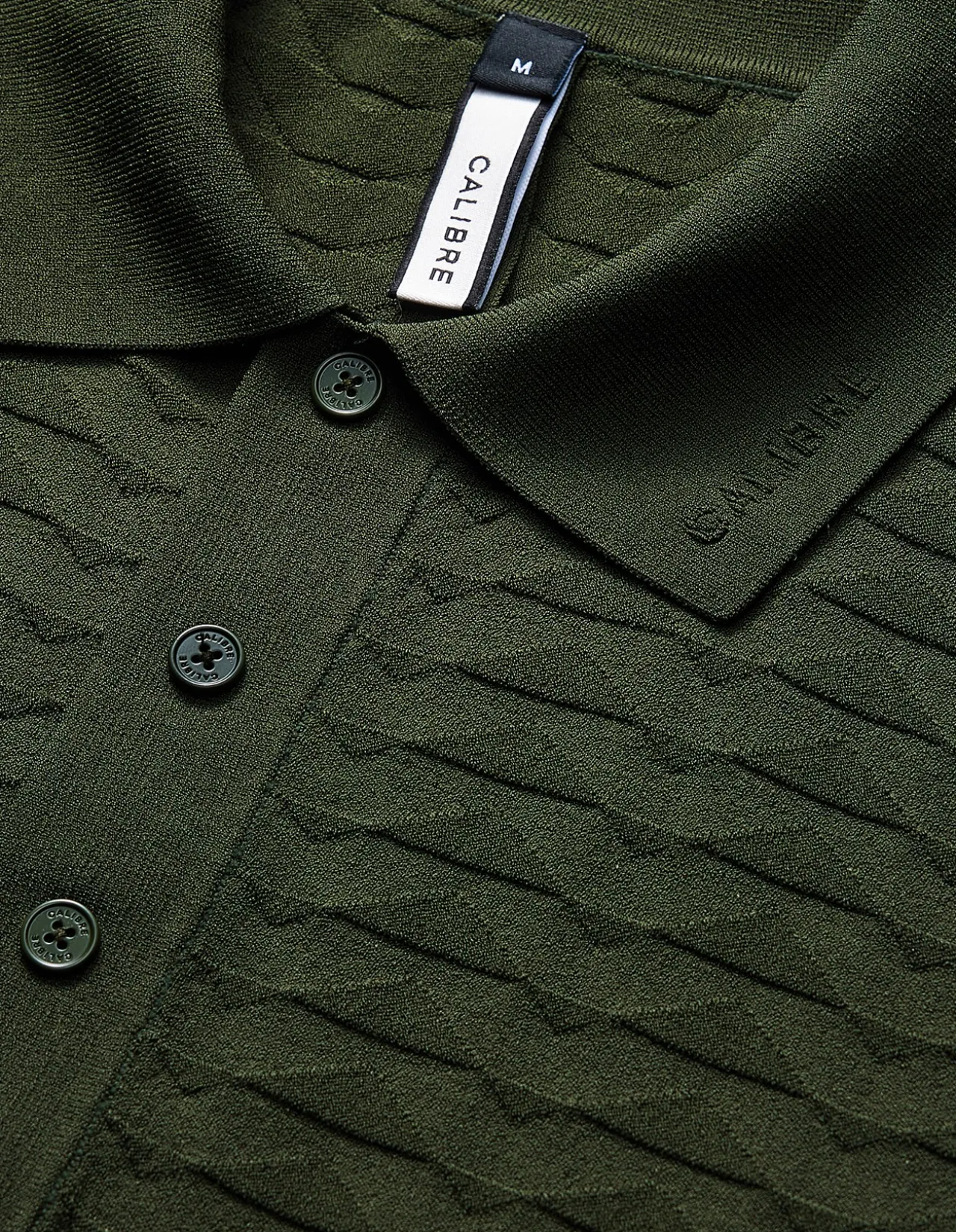 TRIANGLE KNIT POLO
